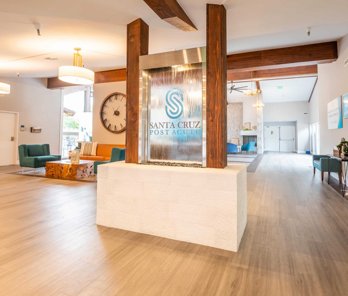 A modern lobby with stylish decor, featuring wooden beams and comfortable seating.