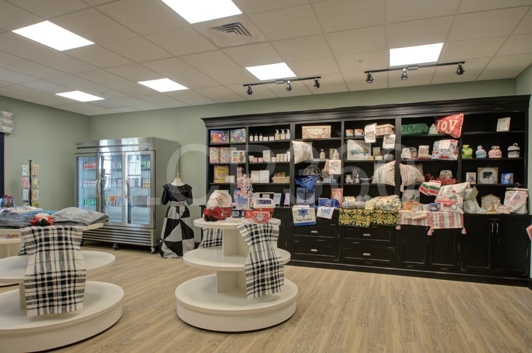 Interior of a retail store with products displayed on shelves.