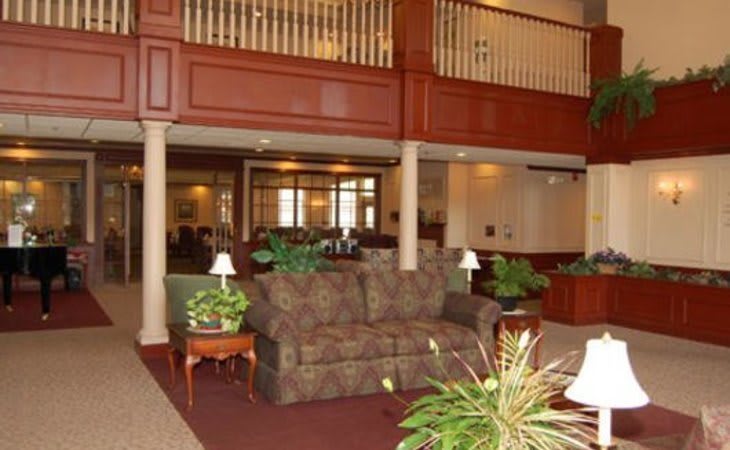 A cozy hotel lobby with comfortable seating and elegant decor.