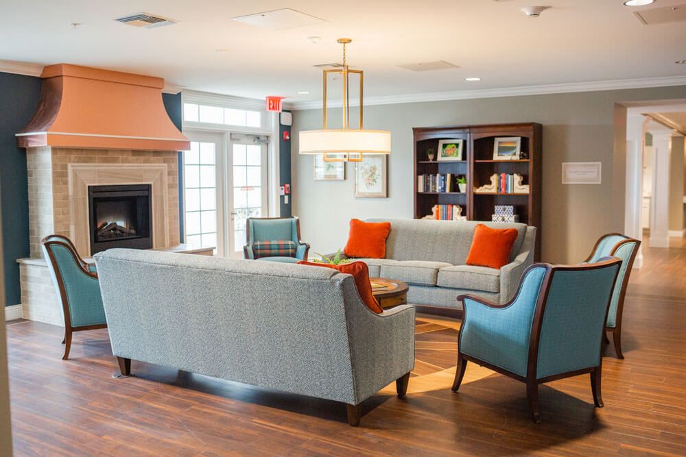 A cozy living room with modern furnishings and warm lighting.