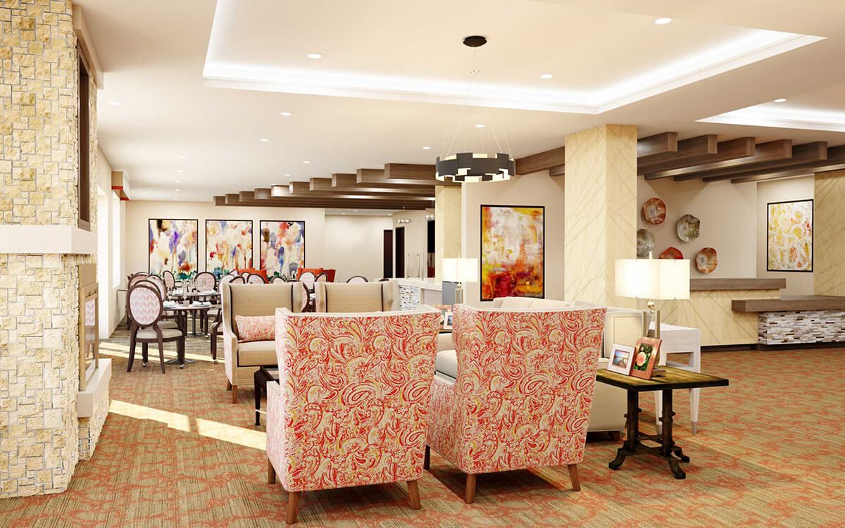 A beautifully designed living space featuring patterned chairs and vibrant artwork.