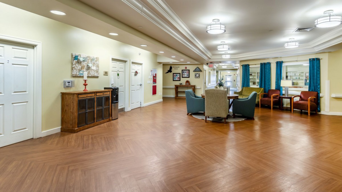 A spacious and modern lobby with comfortable seating and elegant lighting.