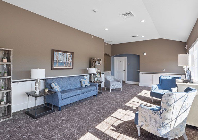 A bright and spacious living room with comfortable seating and stylish decor.