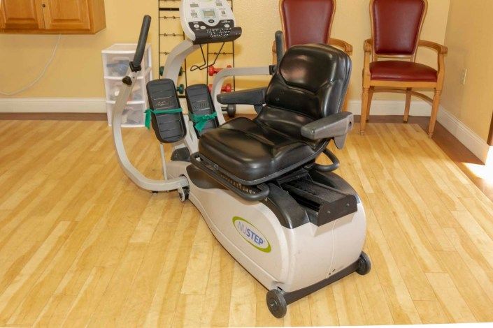 A stationary exercise machine designed for physical therapy and rehabilitation purposes.