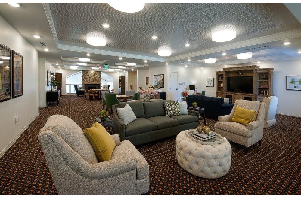 A luxurious living room with comfortable seating and elegant decor.