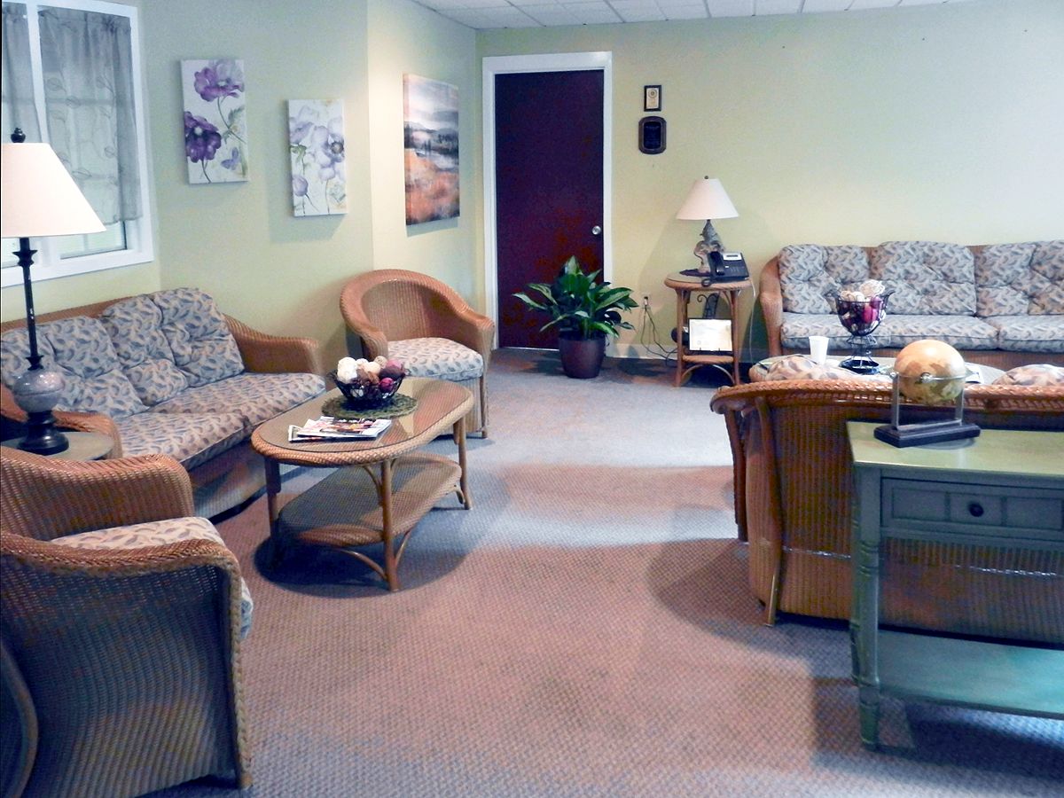 A cozy living room with comfortable seating and tasteful decor.