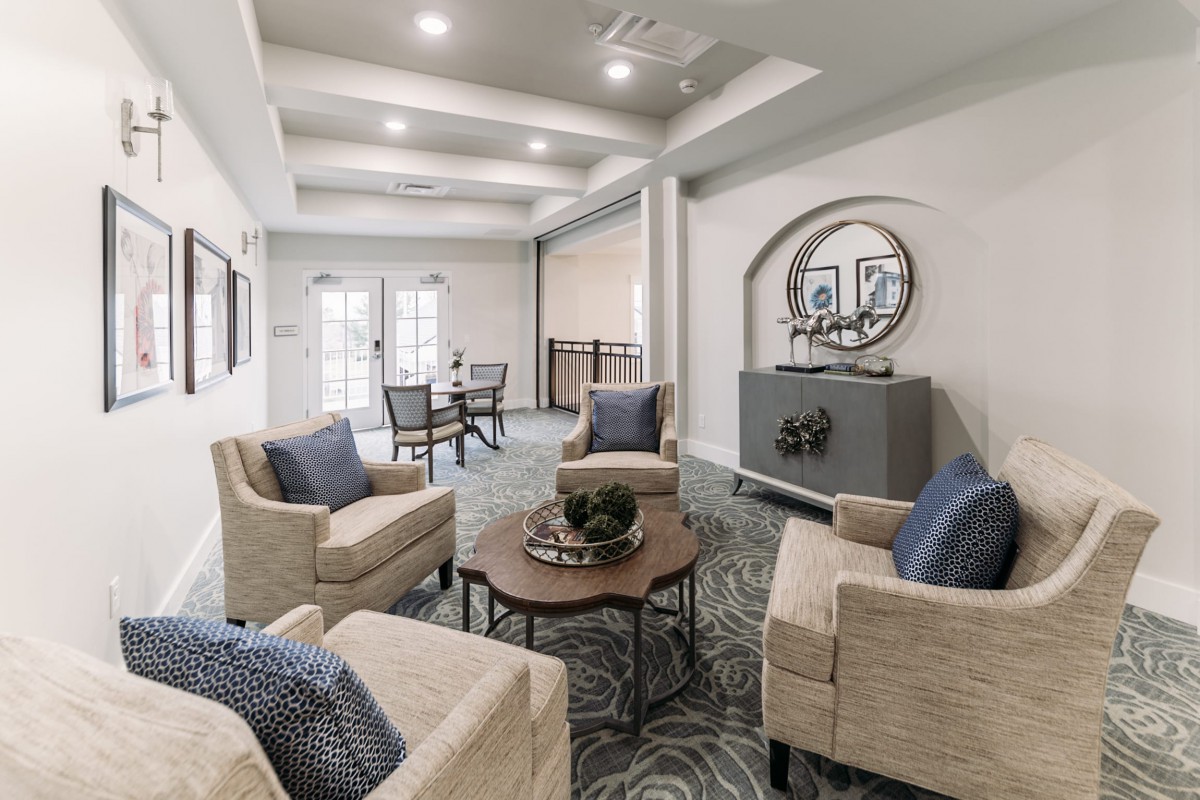 A modern living room with comfortable armchairs and stylish decor.