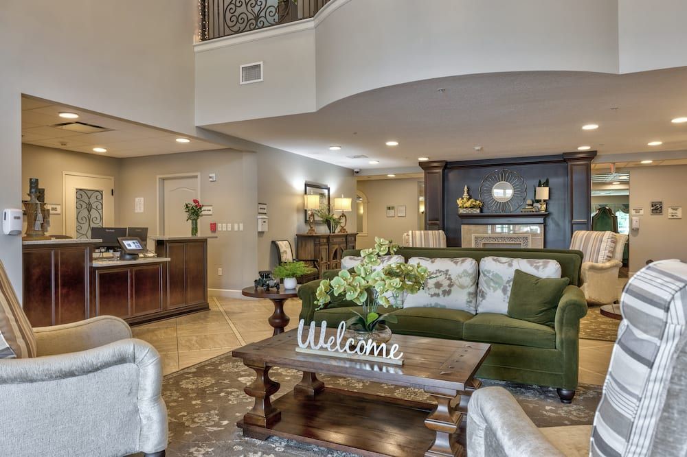 A modern living room with elegant decor and comfortable seating.