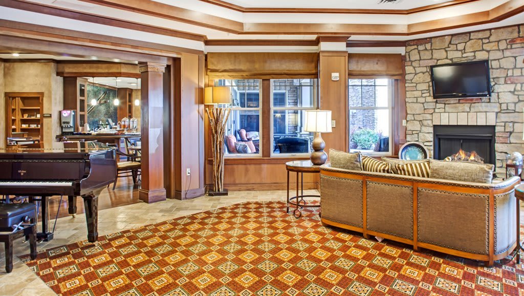 Luxurious hotel lobby with elegant furnishings and ambient lighting.