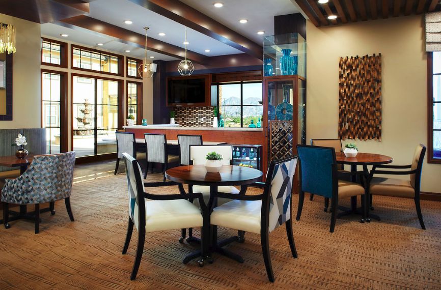 Modern restaurant interior with a stylish dining and bar area.