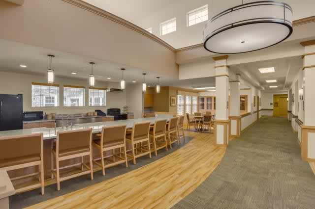 A modern lobby interior with a seating area and stylish lighting.