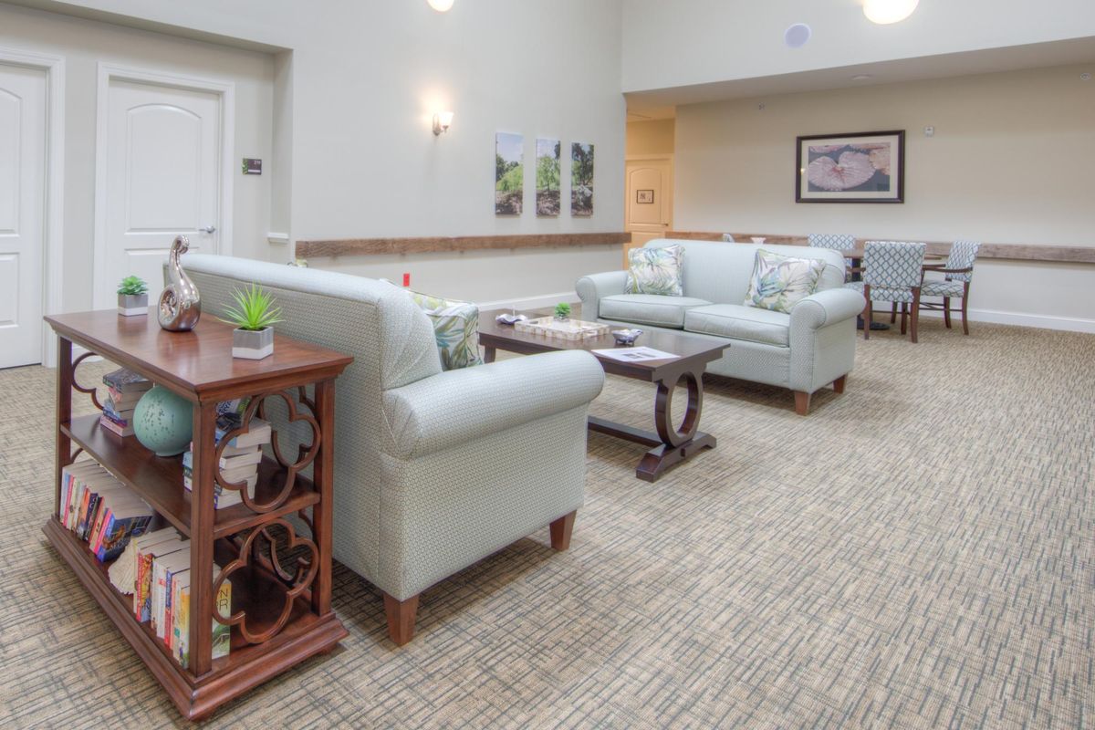 A cozy living room with sofas and a coffee table.