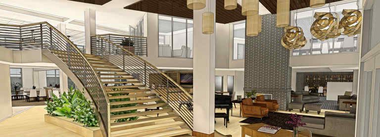 A modern interior featuring a stylish staircase and contemporary living space.