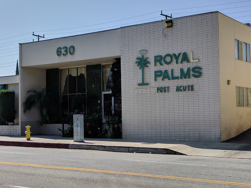 The exterior of Royal Palms, showcasing a modern architectural design.