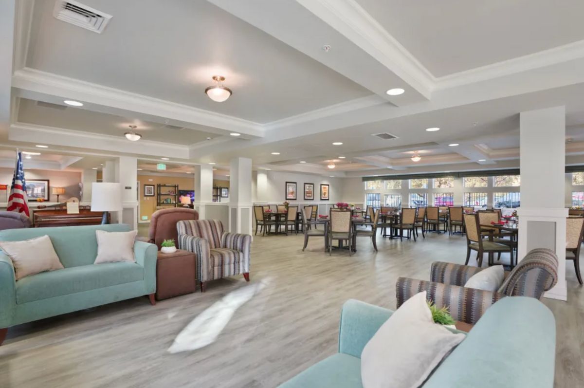 A spacious and modern lobby with comfortable seating and elegant lighting.