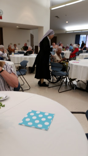A lively community gathering with seniors enjoying their time together.