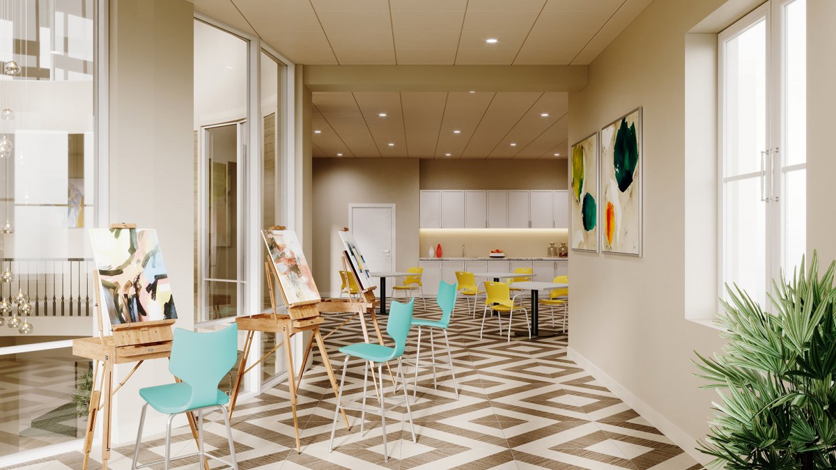 A modern art studio with colorful chairs, geometric flooring, and easels ready for use.