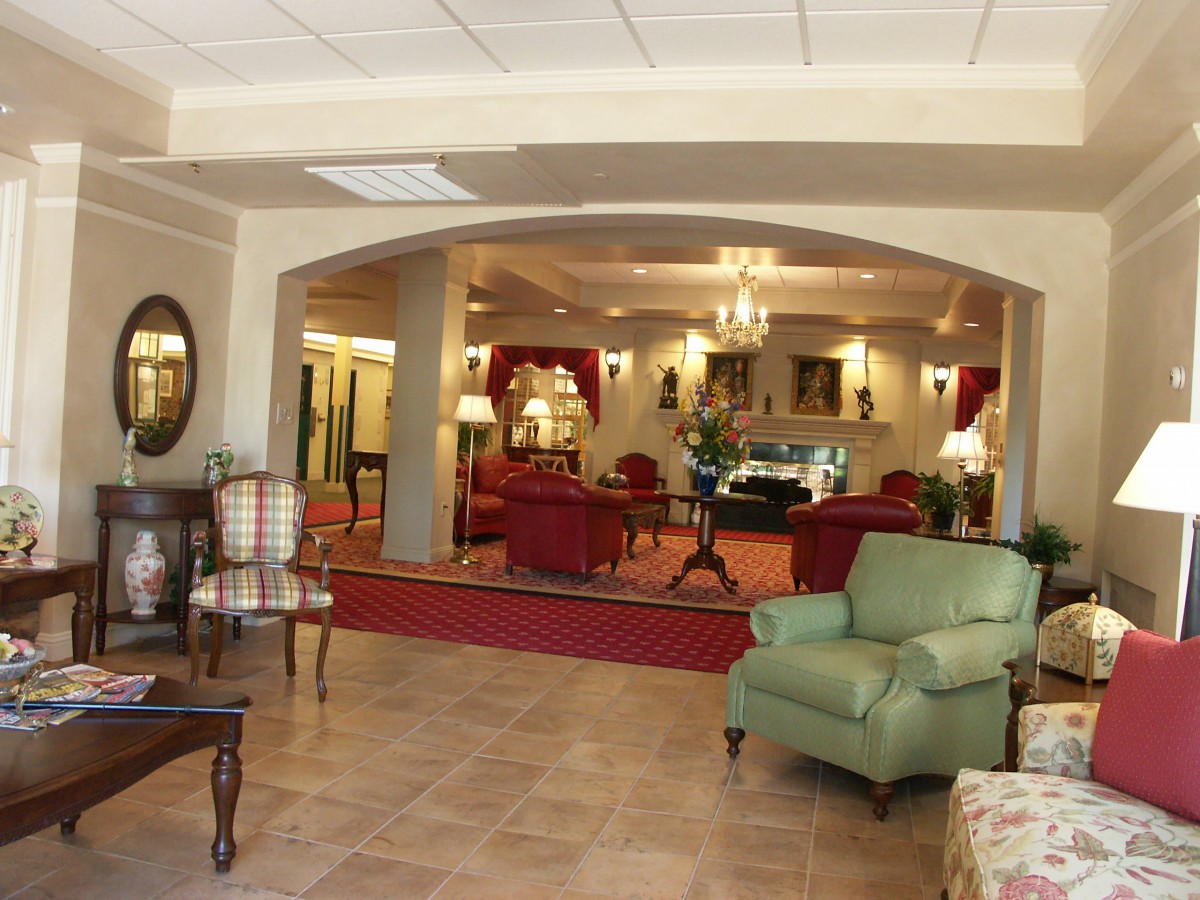 A luxurious hotel lobby with comfortable seating and elegant lighting.