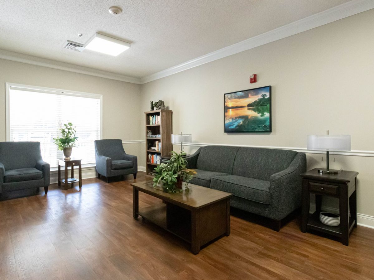 A cozy living room with comfortable seating and modern decor.