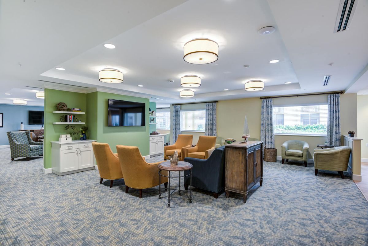 A modern living room with comfortable seating and stylish decor.