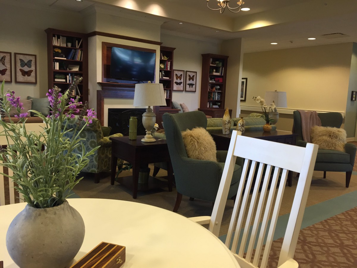A cozy lounge area with comfortable seating and elegant decor.