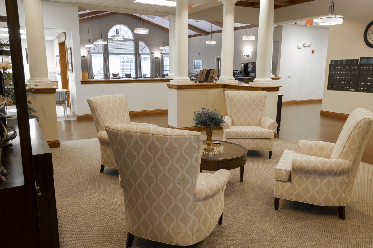 A cozy lobby with elegant seating and classic architectural elements.