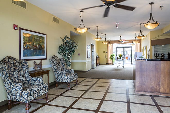 A spacious lobby area with seating and elegant decor.