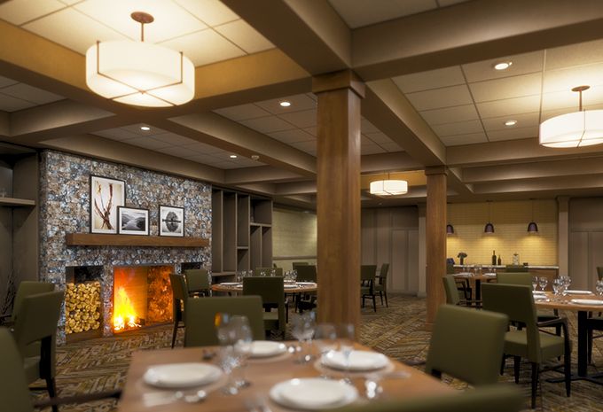 A cozy restaurant dining room with a fireplace and neatly arranged tables.