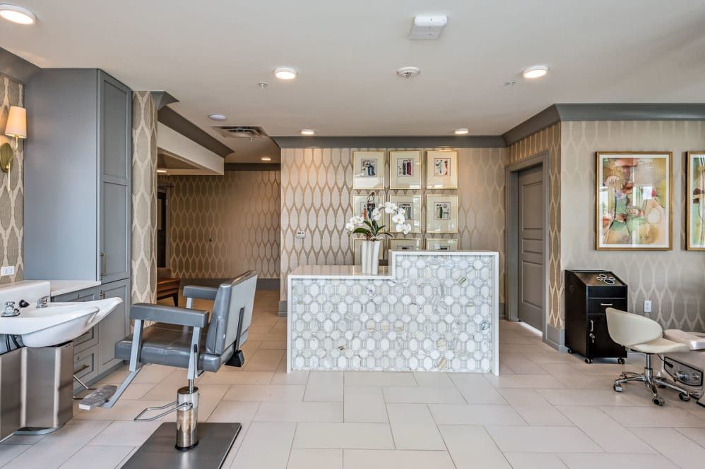 A modern reception area with stylish decor and seating.