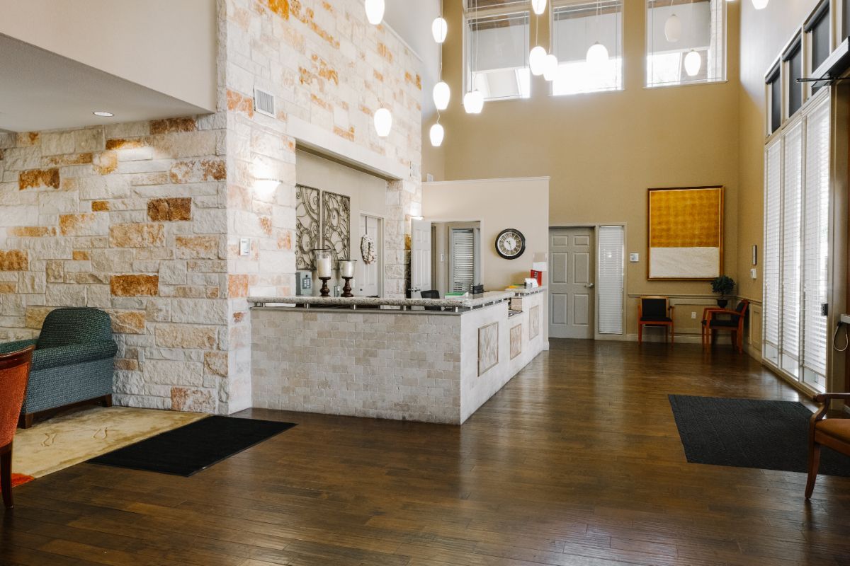 A modern hotel lobby with a spacious reception area and stylish interior design.