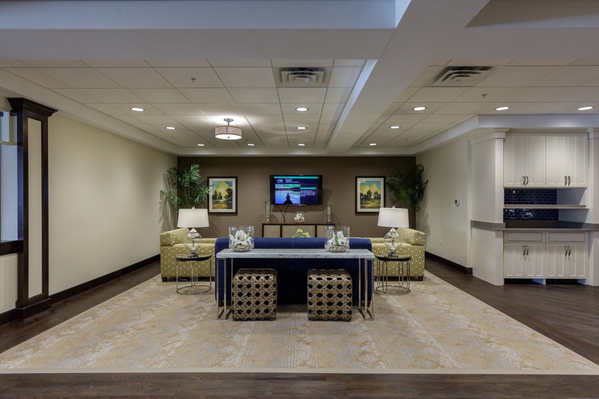 A modern living room with stylish furniture and decorative elements.