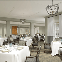 An elegant dining room with neatly arranged tables and chandeliers.