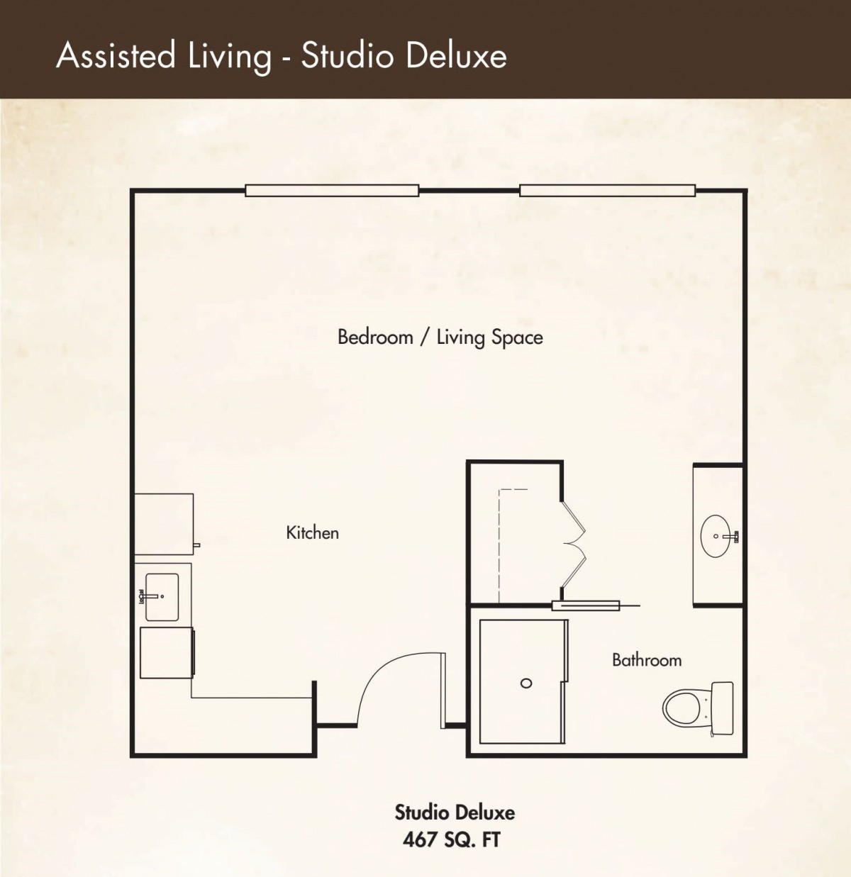 Floor plan of an Assisted Living Studio Deluxe apartment with labeled areas for kitchen, bathroom, and living space.