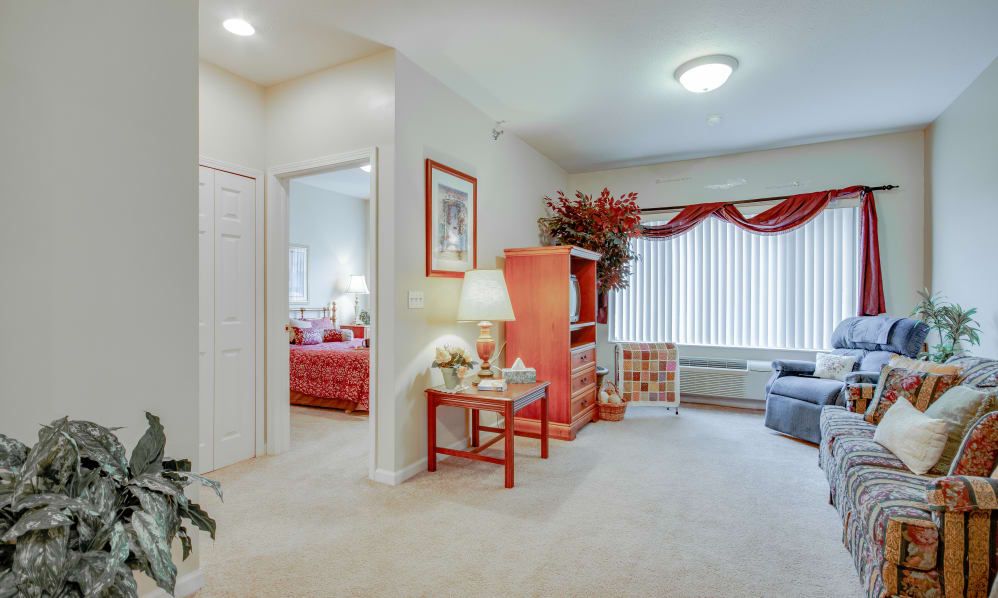 Cozy living room with colorful decor and comfortable furnishings.