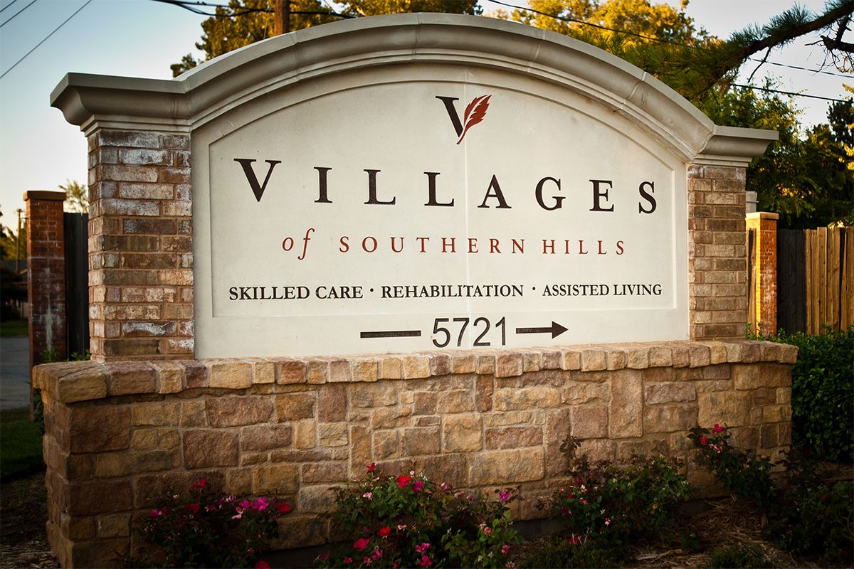Entrance sign for Villages of Southern Hills offering skilled care, rehabilitation, and assisted living.