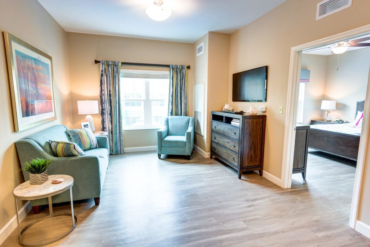 A cozy living room with comfortable seating and modern decor.