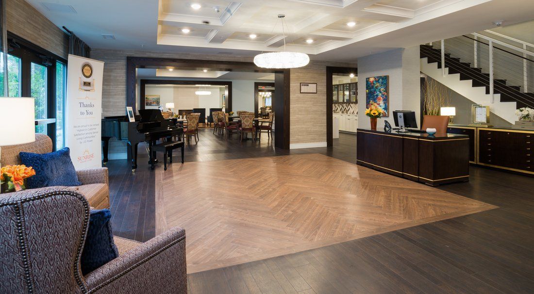 A modern hotel lobby with elegant furnishings and stylish lighting.