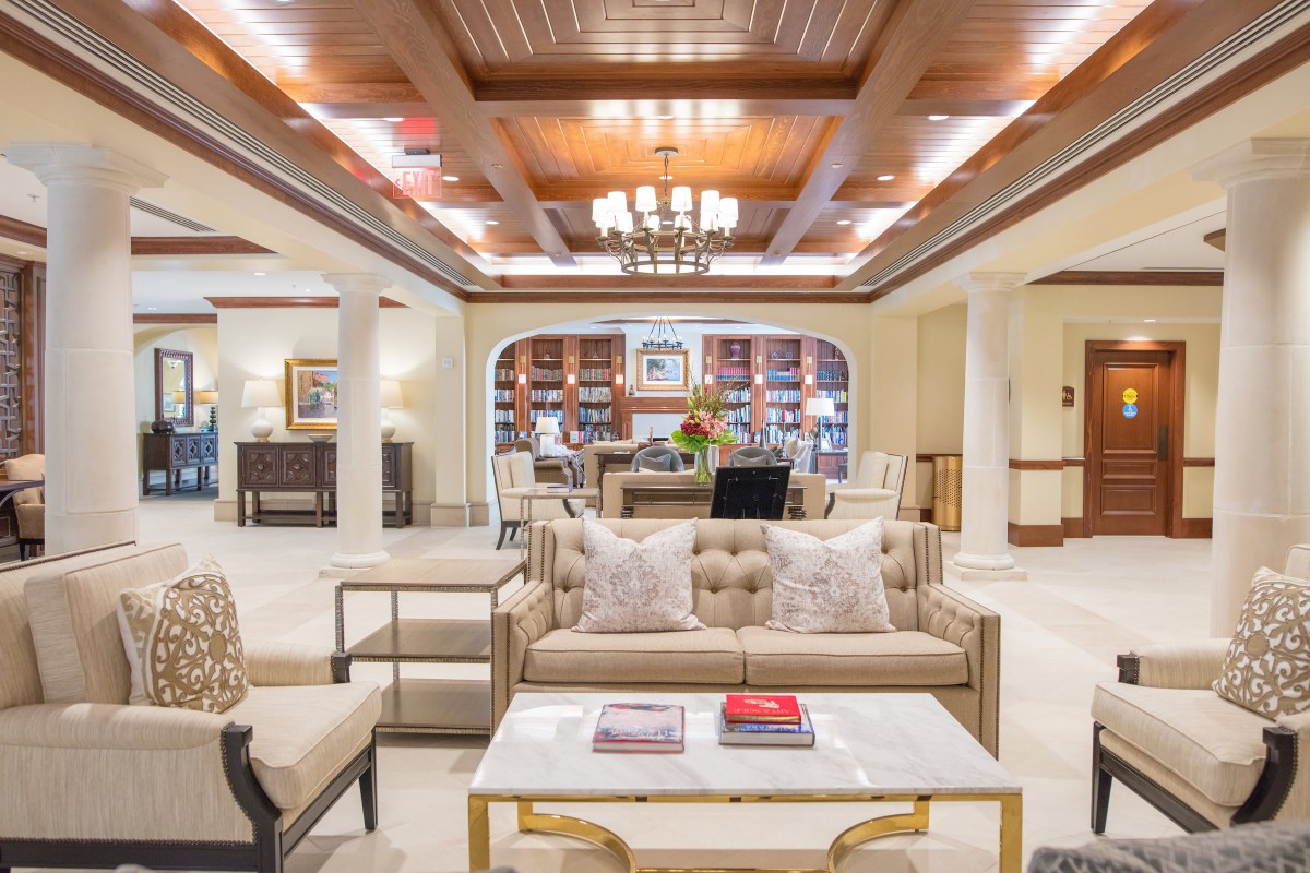 A luxurious living room interior with elegant furniture and decor.