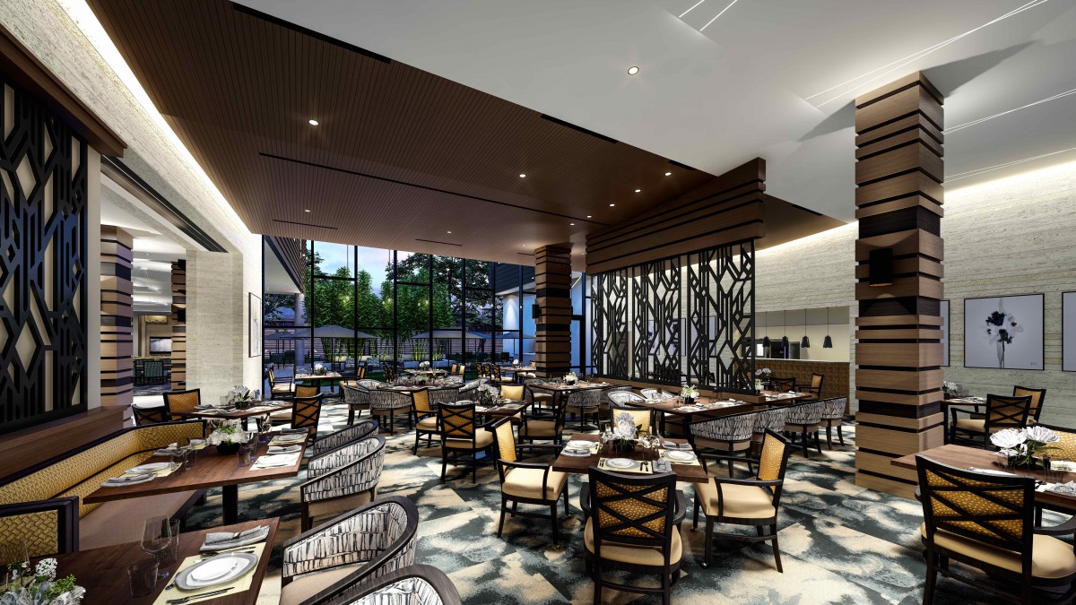 A modern restaurant interior featuring stylish furniture and large windows.