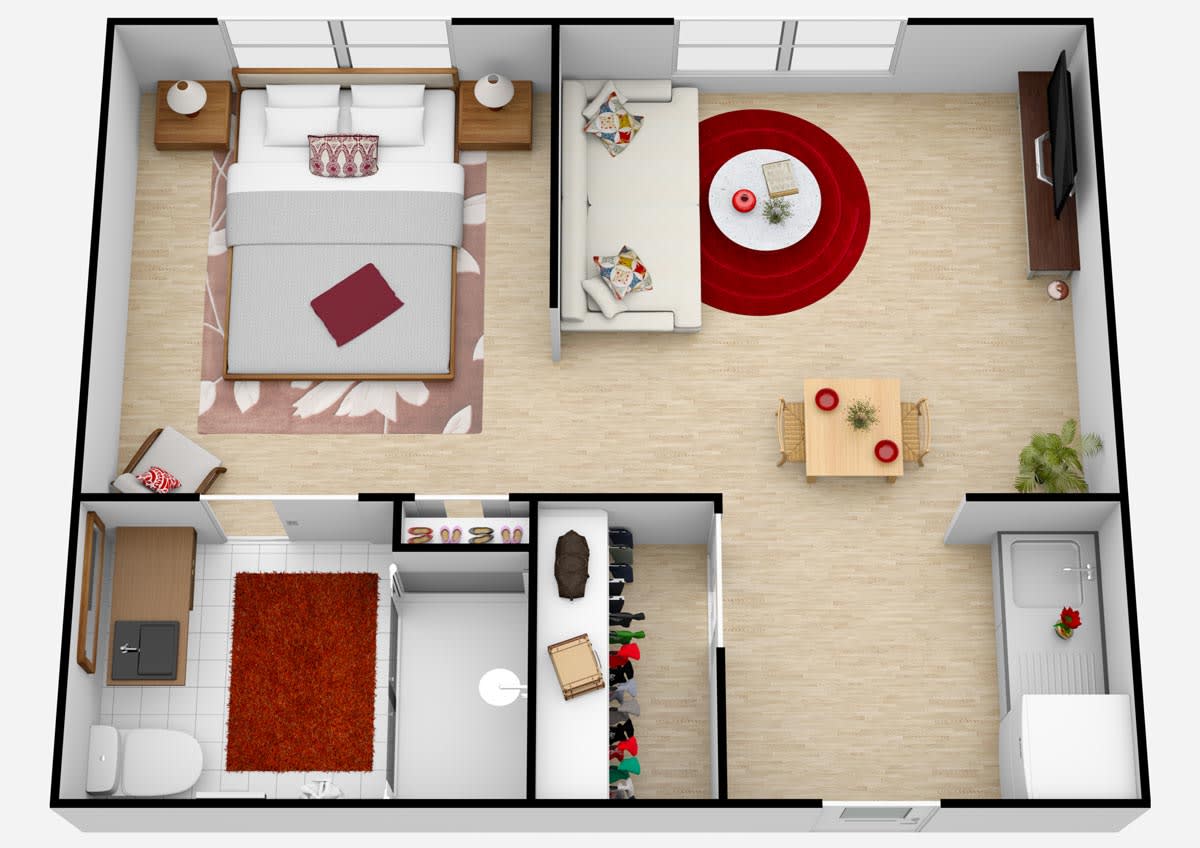 A detailed floor plan of an apartment showcasing a bedroom, living room, and furniture arrangement.