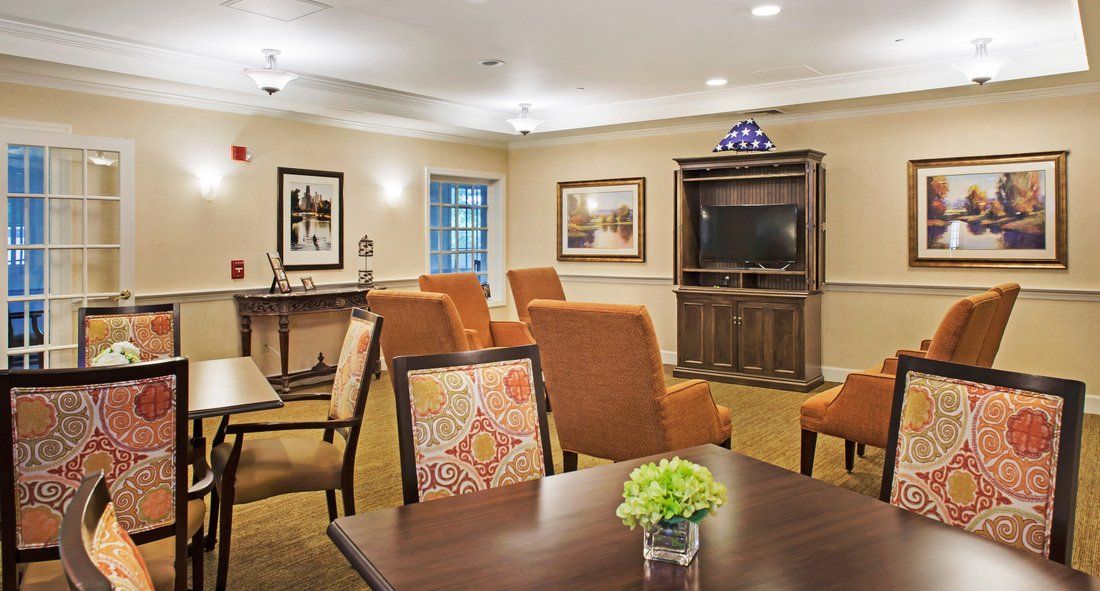 A cozy living room with comfortable seating and a television.
