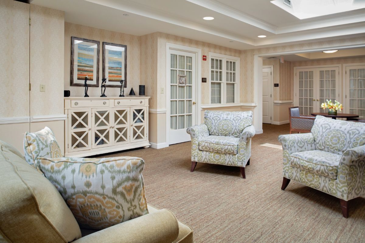 A cozy living room with comfortable chairs and elegant decor.