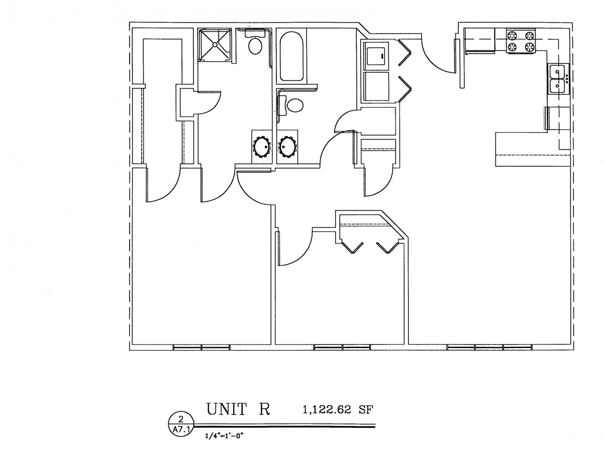 Architectural floor plan of Unit R, showing the layout of rooms and amenities.