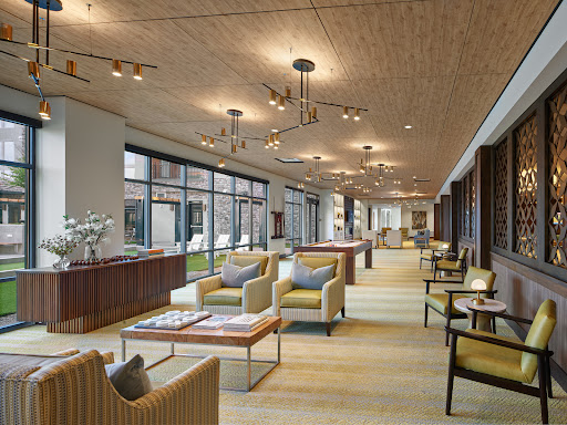 A spacious and modern lounge area designed for comfort and relaxation.