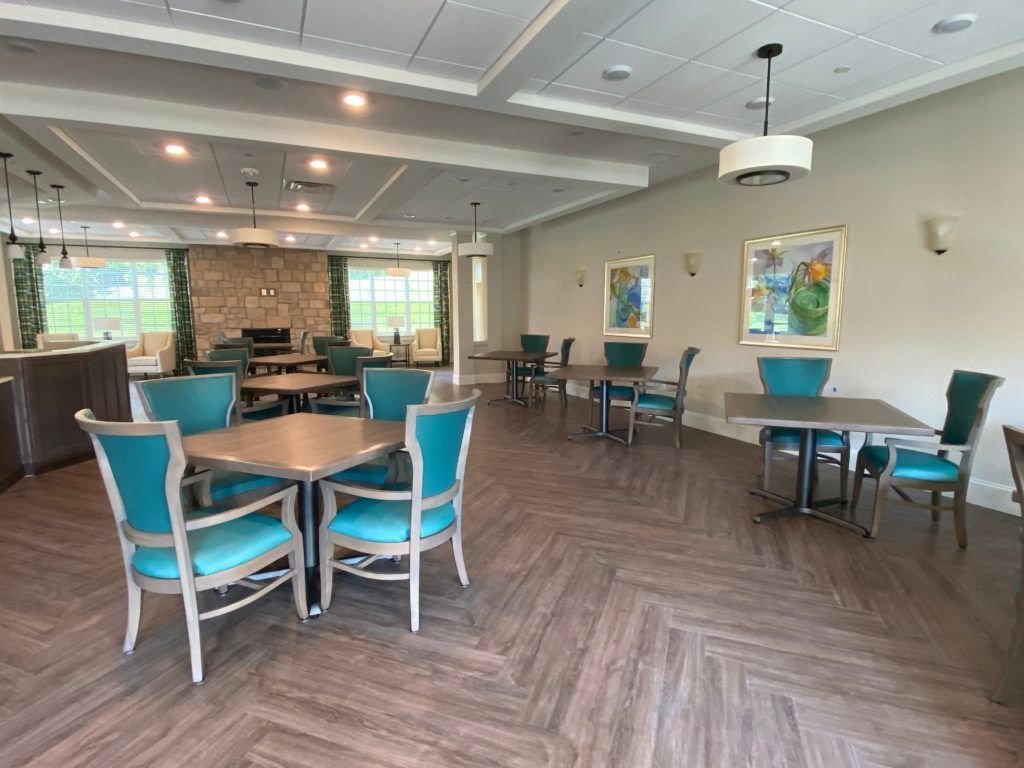 Spacious and modern dining area with elegant furnishings and decor.