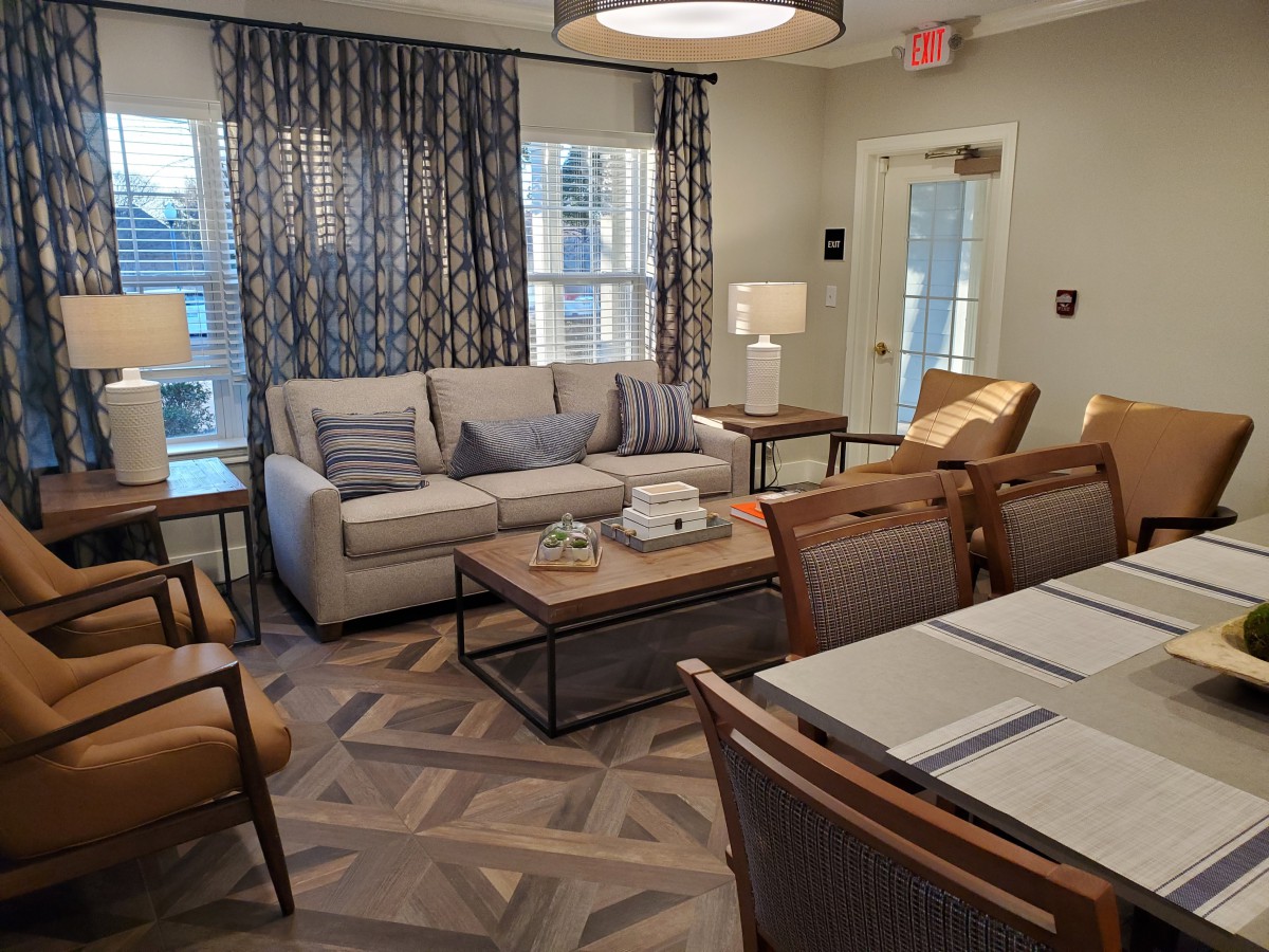 A modern living room with comfortable seating and stylish decor.