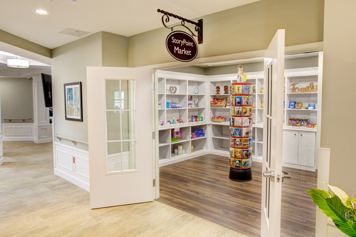 An inviting bookstore with neatly arranged shelves and an open entrance.