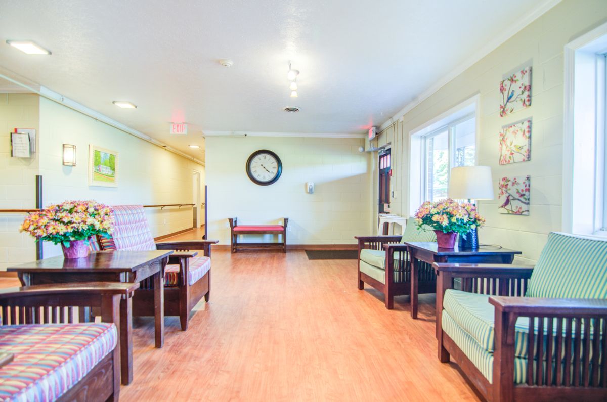 A bright and welcoming lobby area with comfortable seating and decorative elements.