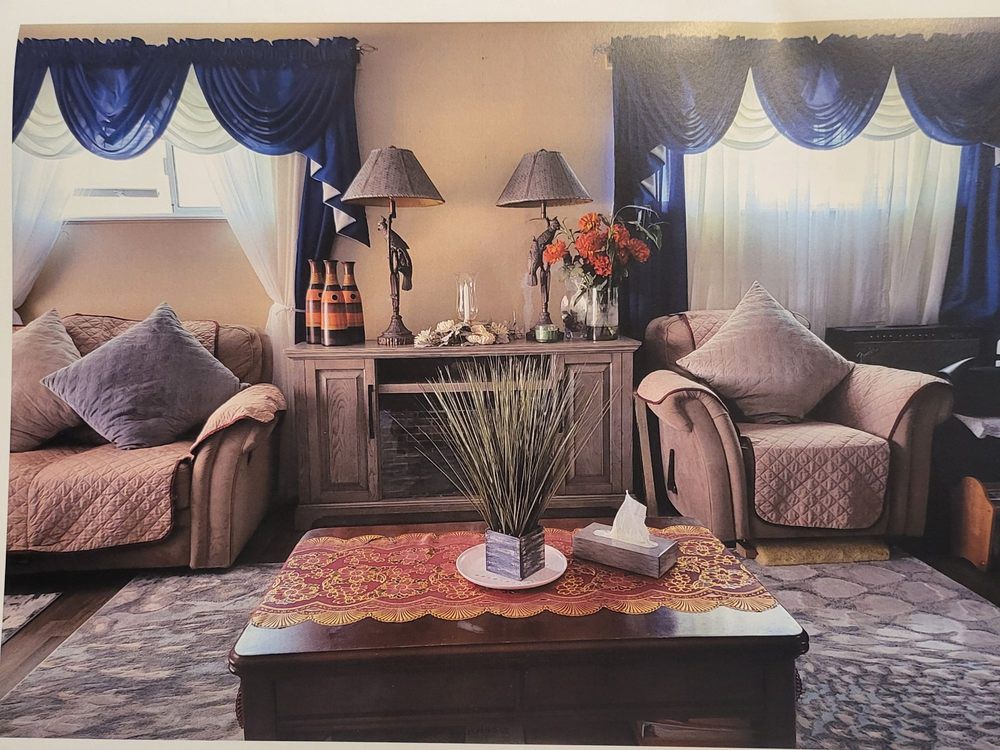 Elegant living room with cozy furniture and decorative accents.