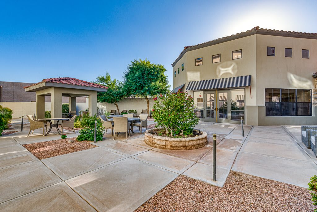 A well-maintained courtyard with outdoor seating and landscaping.
